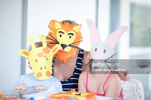 children's mask making party - family rabbit stock pictures, royalty-free photos & images