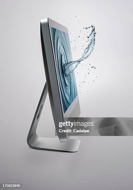 computer screen with splash of water on screen - cadalpe stock pictures, royalty-free photos & images