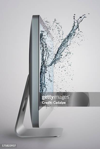 computer screen with splash of water on screen - cadalpe stock pictures, royalty-free photos & images