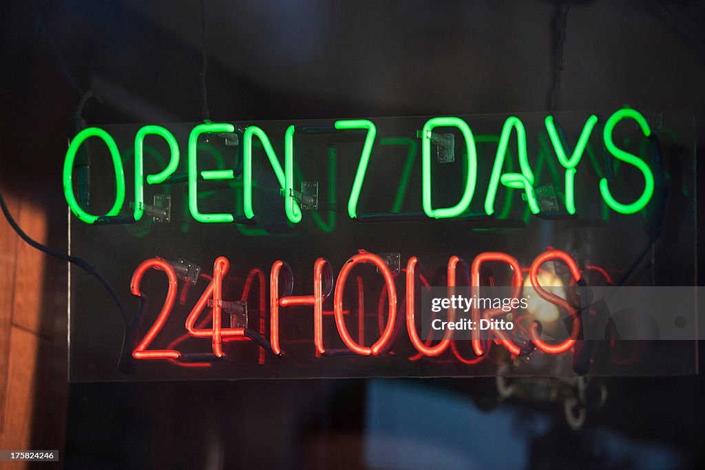 24 hour illuminated neon sign