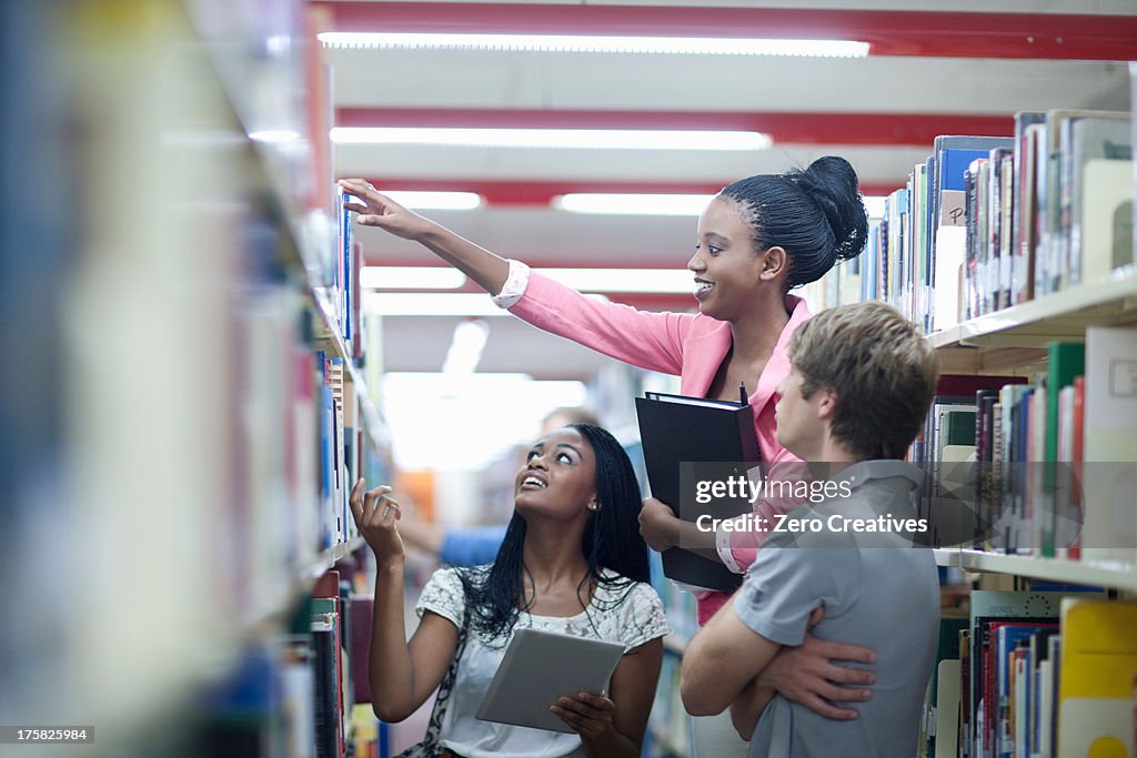 Student Using Card Library Entry Students In Library With Digital Tablet High-Res Stock Photo - Getty Images
