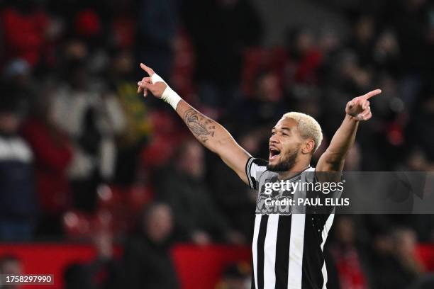 Newcastle United's Brazilian striker Joelinton celebrates at the end of the English League Cup fourth round football match between Manchester United...
