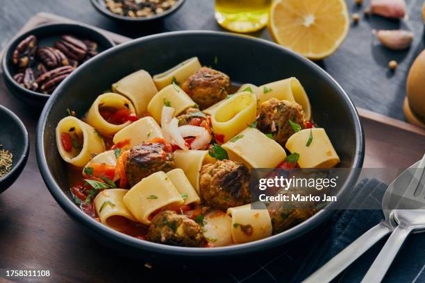 luxury vegetarian paccheri pasta with vegetable meatballs. art of well-being: vegetarian italian brunch - paccheri bildbanksfoton och bilder