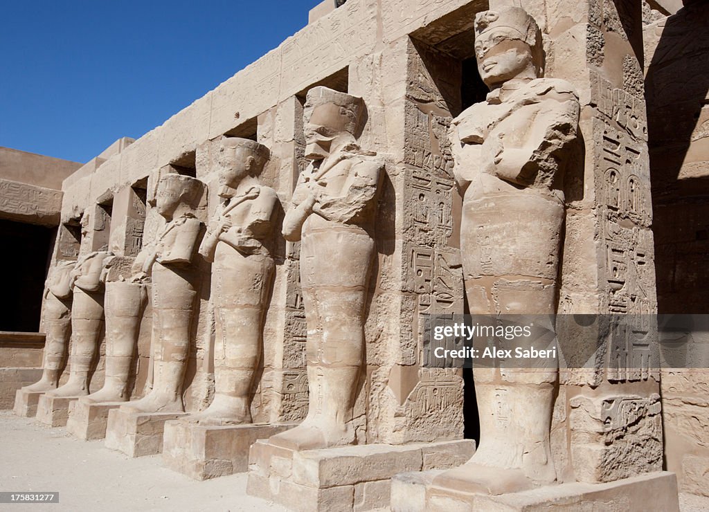 Karnak temple sculpture and hieroglyphics.
