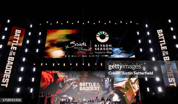 John Fury, Dev Sahni, Sugarhill Steward, Tyson Fury, Frank Warren, Bob Arum, Francis Ngannou, Dewey Cooper and Mike Tyson look on during a press...