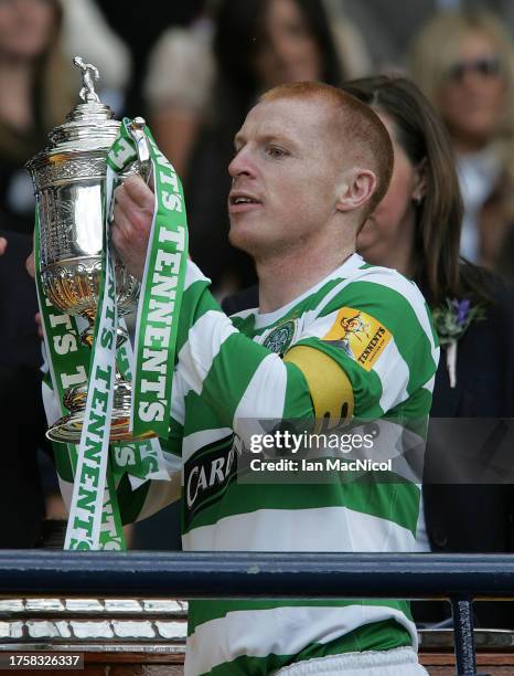 Celtic captain Neil Lennon is seen with the trophy during the Tennents Scottish Cup Final between Celtic and Dunfermline Athletic at Hampden Park on...