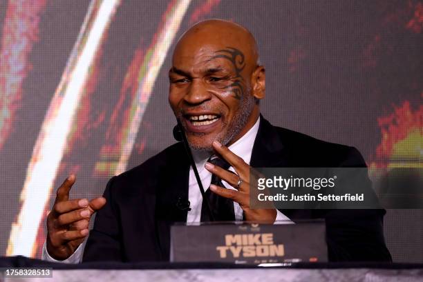 Mike Tyson reacts during a press conference ahead of the Tyson Fury v Francis Ngannou boxing match at Boulevard Hall on October 26, 2023 in Riyadh,...