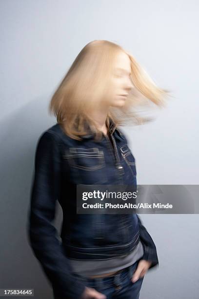 young woman tossing her hair - skaka på huvudet bildbanksfoton och bilder