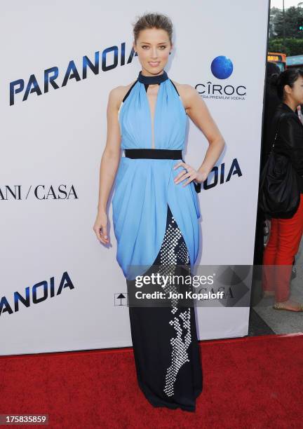 Actress Amber Heard arrives at the Los Angeles Premiere "Paranoia" at DGA Theater on August 8, 2013 in Los Angeles, California.