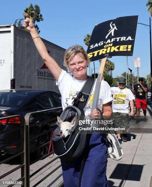 Martha Plimpton joins the picket line outside Warner Bros. Studios on October 26, 2023 in Burbank, California. SAG-AFTRA has been on strike since...