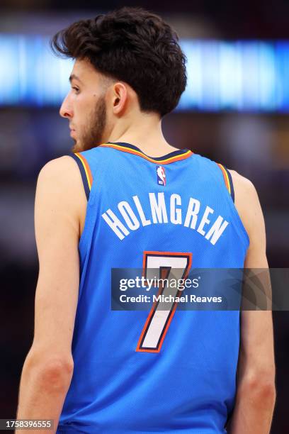 Chet Holmgren of the Oklahoma City Thunder looks on against the Chicago Bulls during the first half at the United Center on October 25, 2023 in...