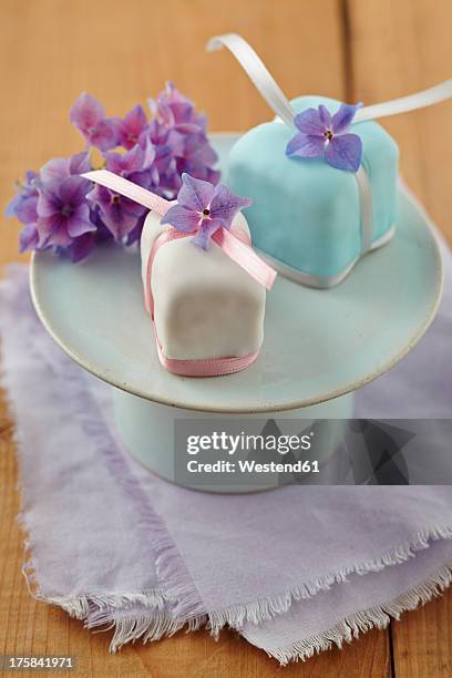 candy cakes and petit four filled with jam - プチフール ストックフォトと画像