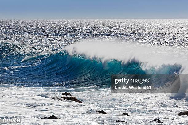 spain, breaking of waves at la gomera - gomera ストックフォトと画像