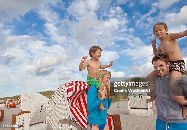 germany, family on baltic sea - hooded beach chair stock pictures, royalty-free photos & images