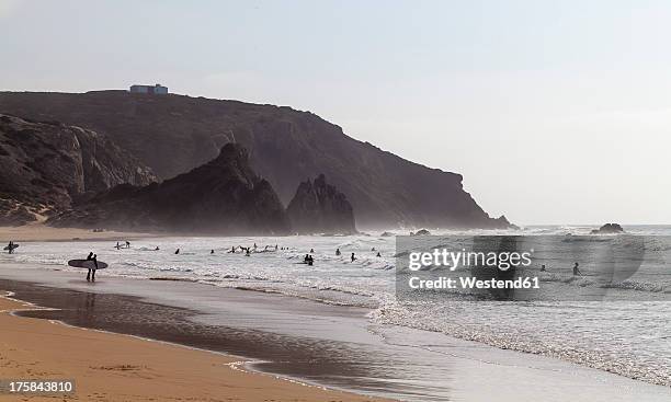 portugal, surfers at praia do amado - sagres ストックフォトと画像