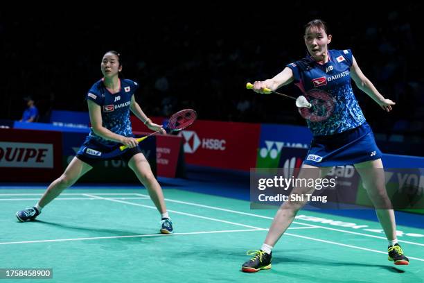 Mayu Matsumoto and Wakana Nagahara of Japan compete in the Women's Doubles Second Round match against Rui Hirokami and Yuna Kato of Japan during day...