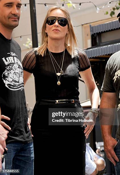 Sharon Stone attends the 4th annual Kiehl's LifeRide for amfAR at The Grove on August 8, 2013 in Los Angeles, California.