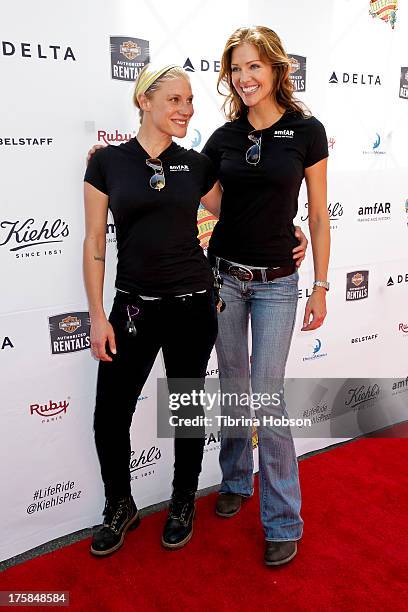 Katee Sackhoff and Tricia Helfer attend the 4th annual Kiehl's LifeRide for amfAR at The Grove on August 8, 2013 in Los Angeles, California.