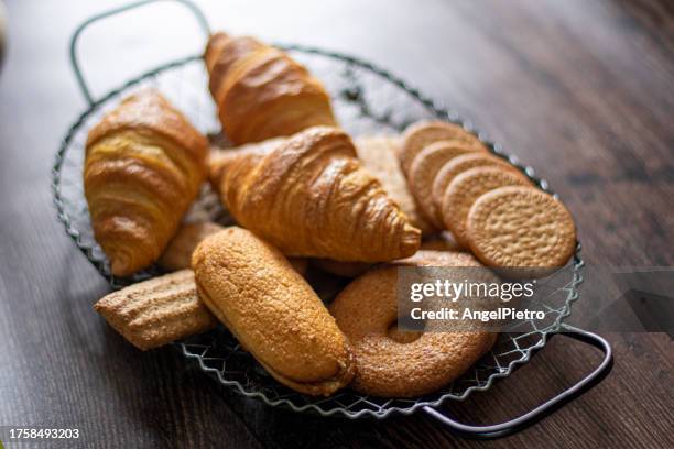 openwork metal tray with cookies of various types and flavors. - cannes food stock pictures, royalty-free photos & images