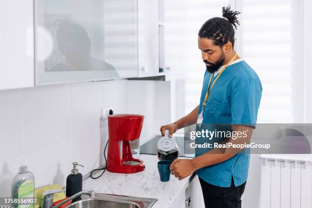 Intern Tea Making Intern Making Coffee Photos and Premium High Res Pictures - Getty Images