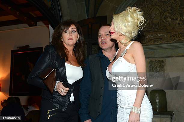 Krista Keller Stodden, Doug Hutchison and Courtney Stodden attend an exclusive party to celebrate the launch of "Passion and Pleasure" hosted by...