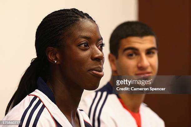 Christine Ohuruogu of Great Britain looks on with Adam Gemili of Great Britain during a British Athletics press conference at the Crowne Plaza Hotel...