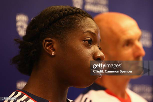 Anyika Anuora of Great Britain talks during a British Athletics press conference at the Crowne Plaza Hotel ahead of the 14th IAAF World Athletics...