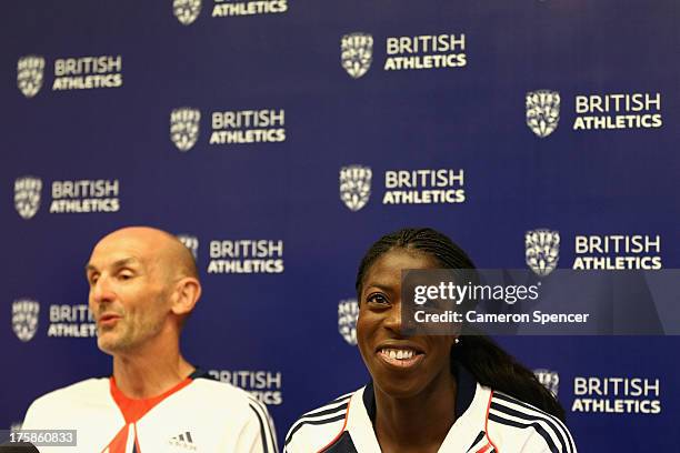 Christine Ohuruogu of Great Britain and British Athletics Performance Director Neil Black react to a question during a British Athletics press...