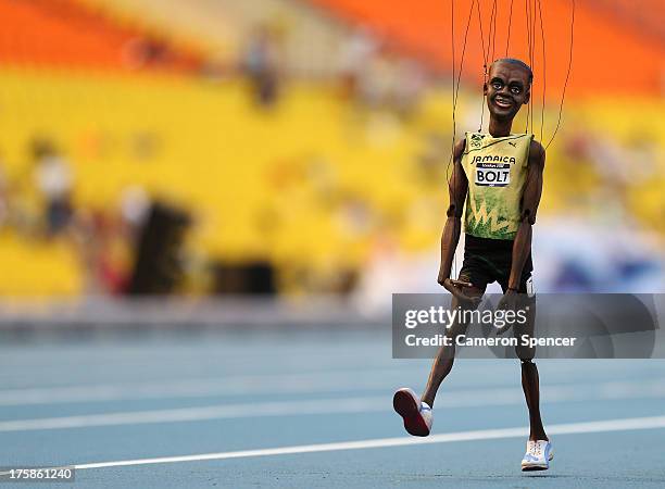 Usain Bolt of Jamaica puppet is seen on the track ahead of the 14th IAAF World Athletics Championships Moscow 2013 at the Luzhniki Sports Complex on...