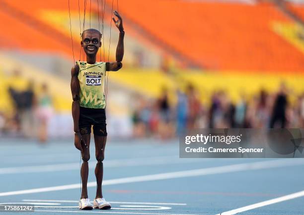 Usain Bolt of Jamaica puppet is seen on the track ahead of the 14th IAAF World Athletics Championships Moscow 2013 at the Luzhniki Sports Complex on...