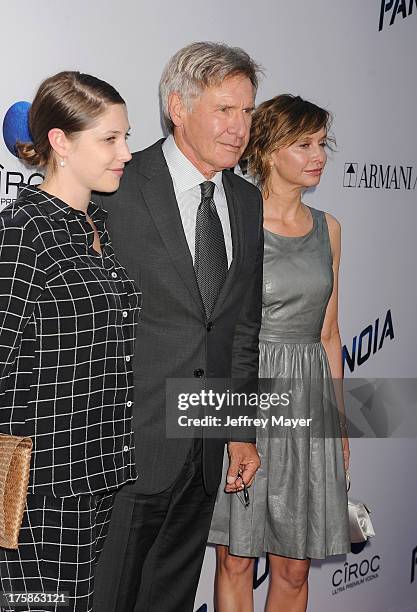 Actors Harrison Ford;Calista Flockhart arrive at the 'Paranoia' - Los Angeles Premiere at DGA Theater on August 8, 2013 in Los Angeles, California.