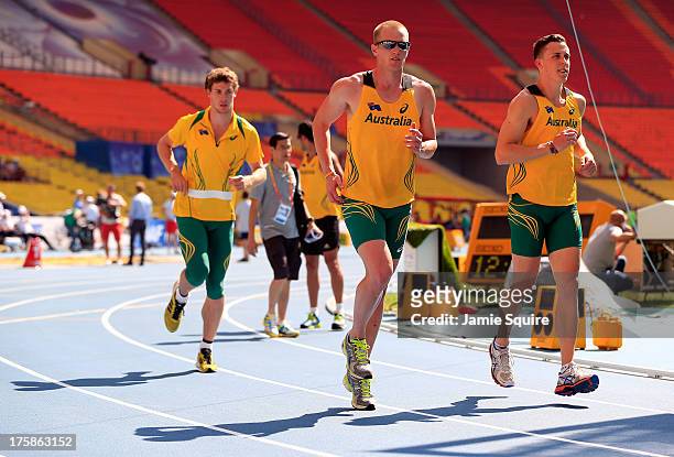 Australian athletes warm up on the track ahead of the 14th IAAF World Athletics Championships Moscow 2013 at the Luzhniki Sports Complex on August 9,...