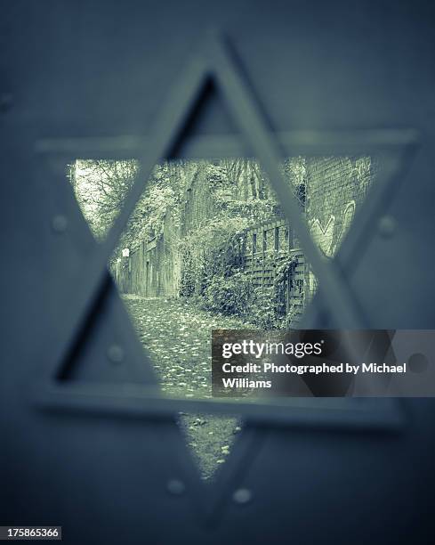 gated yard - judenstern stock-fotos und bilder