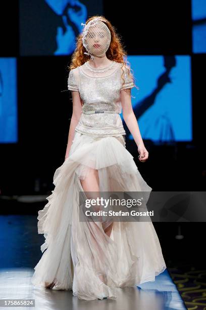 Model showcases designs by Aurelio Costarella on the catwalk during StyleAID 2013 at Crown Perth on August 9, 2013 in Perth, Australia.