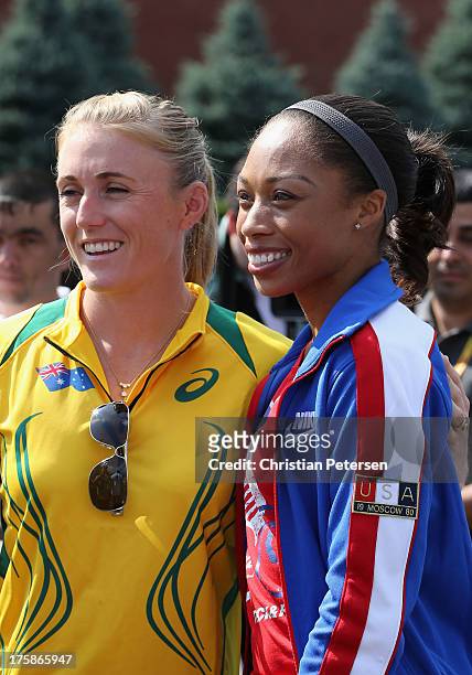 Sally Pearson of Australia and Allyson Felix of USA pose together for photographs outside of St. Basil's Cathedral ahead of the 14th IAAF World...