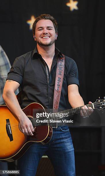 Mike Eli of Eli Young Band performs at "FOX & Friends" All American Concert Series outside of FOX Studios on August 9, 2013 in New York City.