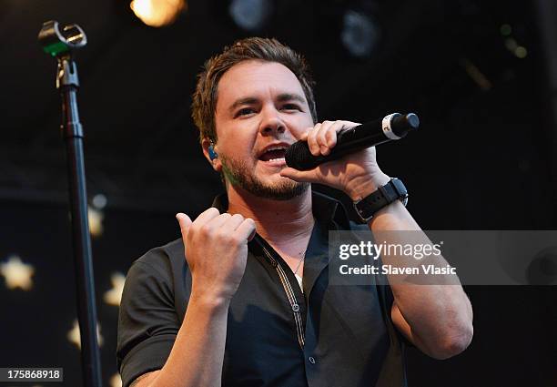 Mike Eli of Eli Young Band performs at "FOX & Friends" All American Concert Series outside of FOX Studios on August 9, 2013 in New York City.