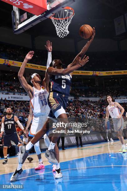Herb Jones of the New Orleans Pelicans drives to the basket during the game against the Oklahoma City Thunder on November 1, 2023 at Paycom Arena in...