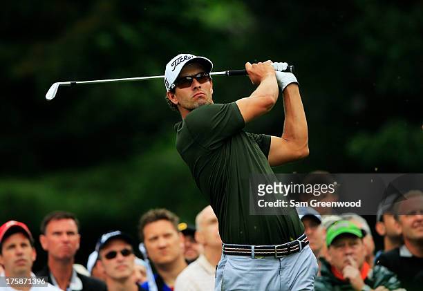 Adam Scott of Australia hits his tee shot on the sixth hole during the second round of the 95th PGA Championship on August 9, 2013 in Rochester, New...