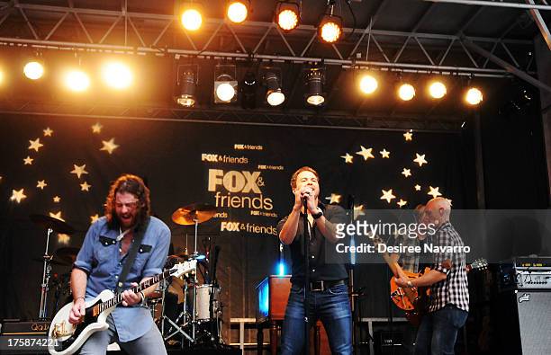 James Young, Mike Eli, Jon Jones of Eli Young band perform during "FOX & Friends" All American Concert Series outside of FOX Studios on August 9,...