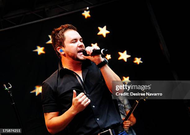 Mike Eli of the Eli Young Band performs during "FOX & Friends" All American Concert Series outside of FOX Studios on August 9, 2013 in New York City.