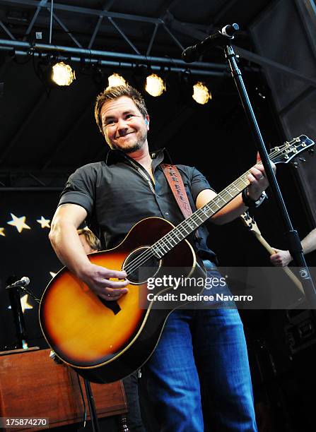 Mike Eli of the Eli Young Band performs during "FOX & Friends" All American Concert Series outside of FOX Studios on August 9, 2013 in New York City.