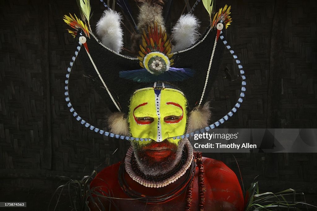 Huli tribal wigman in a village