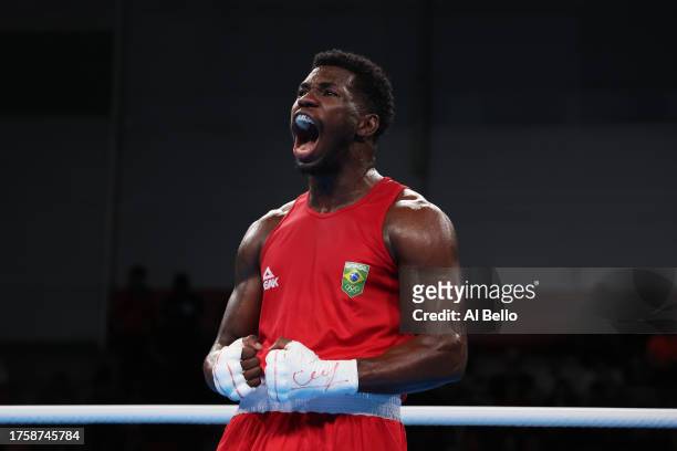 Wanderley de Souza of Team Brazil defeats Cedrick Belony-Duliepre of Team Haiti on Boxing - Men's 80kg semifinals at Centro de Entrenamiento Olimpico...