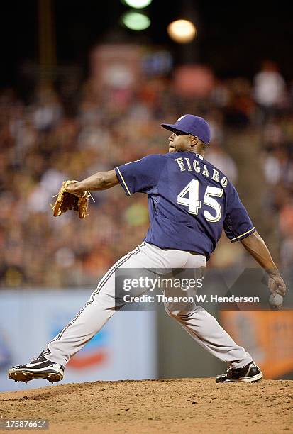 Alfredo Figaro of the Milwaukee Brewers pitches in the six inning against the San Francisco Giants at AT&T Park on August 7, 2013 in San Francisco,...