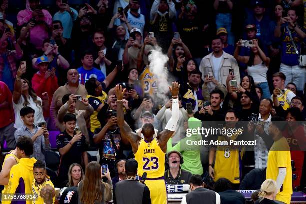 LeBron James of the Los Angeles Lakers interacts with fans before the game against the LA Clippers on November 1, 2023 at Crypto.Com Arena in Los...