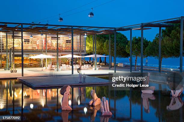 water basin at park of nations at dusk - parque das nações stock pictures, royalty-free photos & images