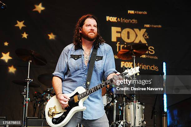 Guitartist James Young of Eli Young Band performs during "FOX & Friends" All American Concert Series outside of FOX Studios on August 9, 2013 in New...