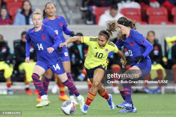 Leicy Santos of Colombia is defended by Andi Sullivan of the United States during the first half of an international friendly match at America First...