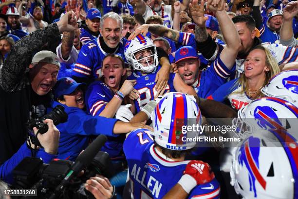 Dalton Kincaid of the Buffalo Bills celebrates after scoring a touchdown against the Tampa Bay Buccaneers during the second quarter of the game at...